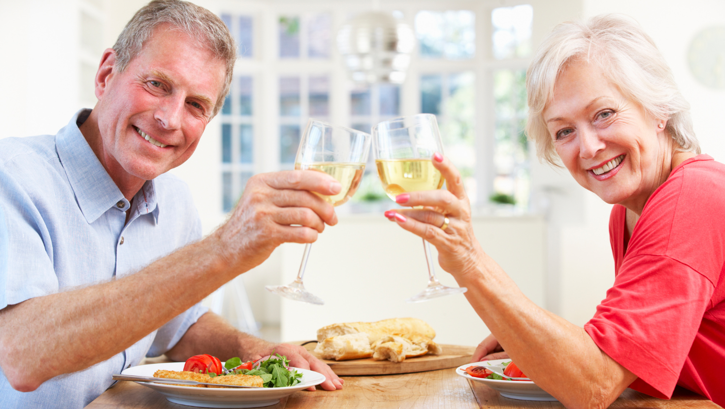 smiling older couple enjoying a meal together at a cozy café Sherman, TX